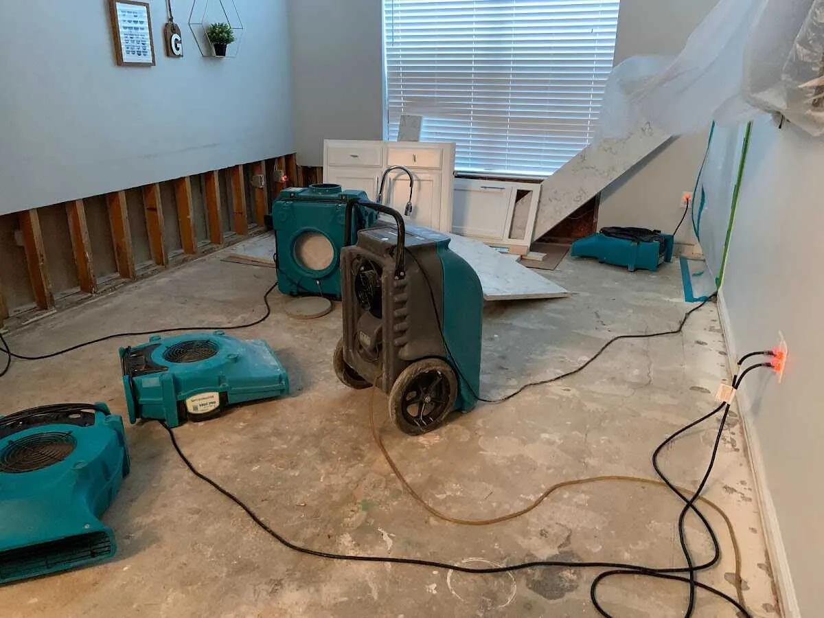 Dehumidifier in flood-cut room for Water Damage Restoration in Wayne
